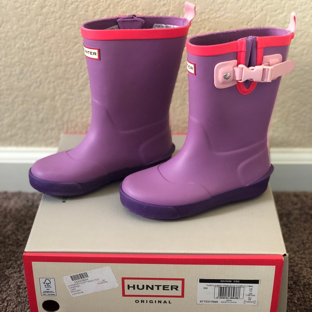 Hunter kids (US 11/UK 10) rain boots.  Thistle/mist pink/acid purple color.
